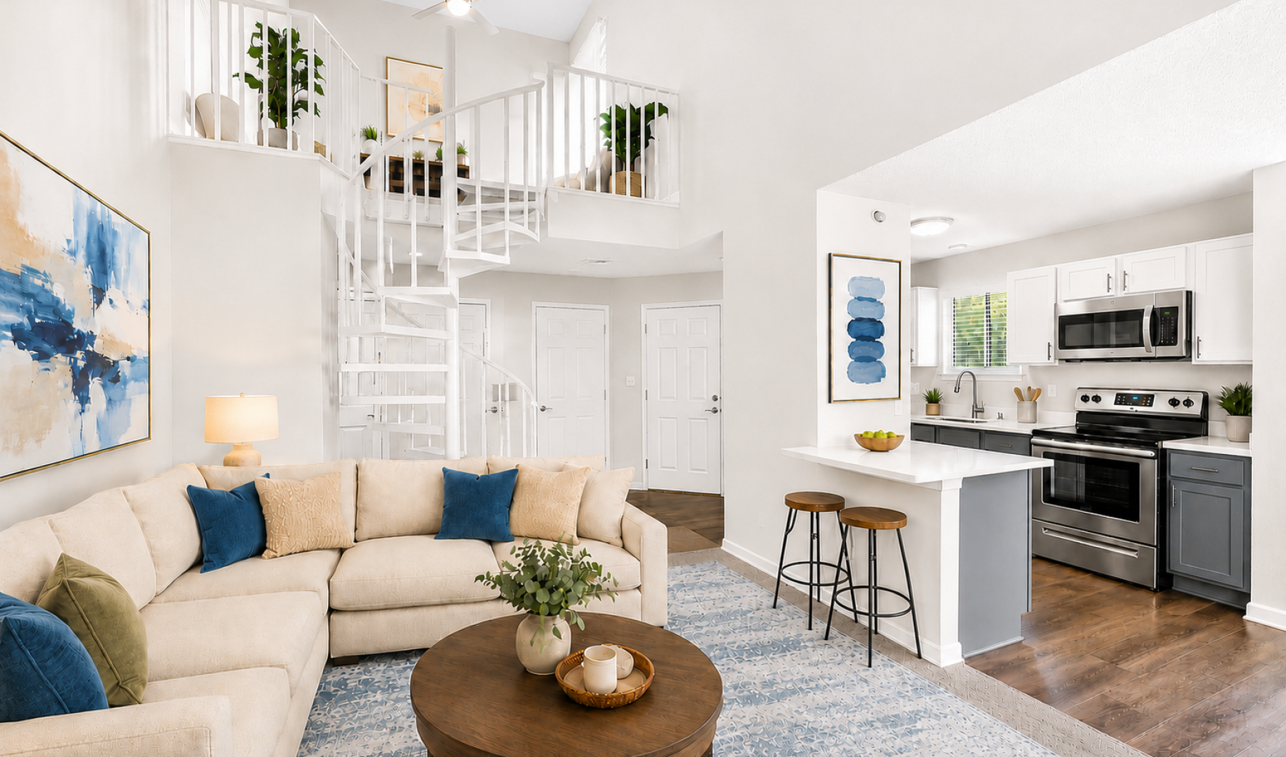 Renovated one-bedroom loft-style-apartment living room with luxury vinyl flooring and natural light at Cambridge Apartments in Raleigh, NC