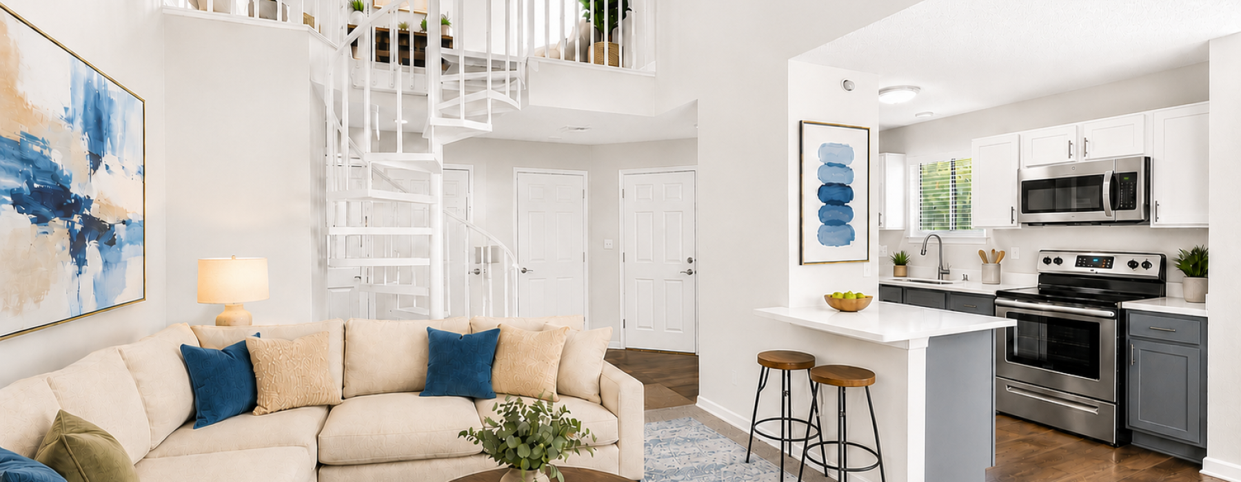 Renovated one-bedroom loft-style-apartment living room with luxury vinyl flooring and natural light at Cambridge Apartments in Raleigh, NC
