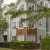 a building with trees in front